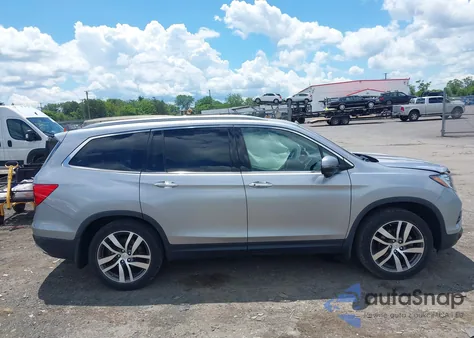 2017 Honda Pilot Touring z USA, uszkodzony, nr VIN 5FNYF6H98HB025426